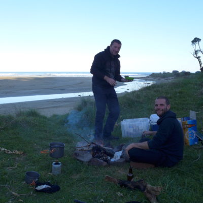 Pre-cooked BBQ on another fire